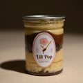 Frasco de postre artesanal Choconutella de Lili Pop con capas de chocolate, vainilla y brigadeiro
